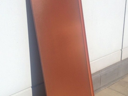 A solar module with a terracotta look.